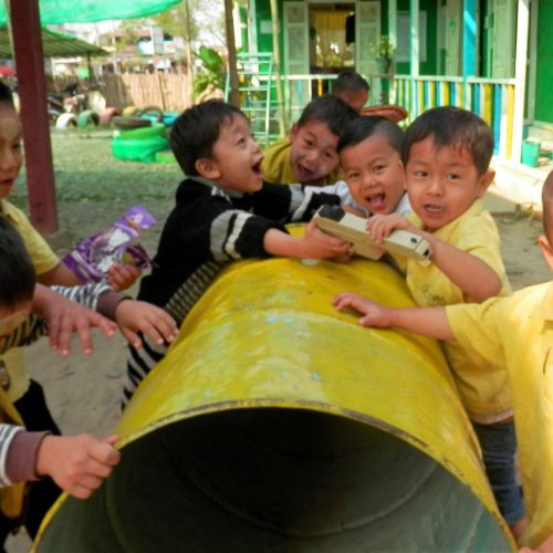 Outdoor play area under plastic roof